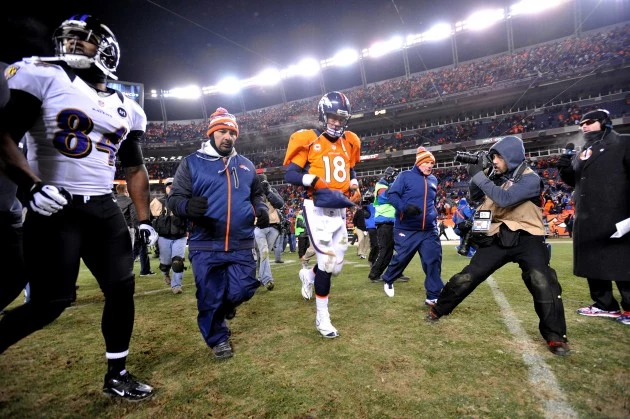 Divisional Playoffs - Baltimore Ravens v Denver Broncos Peyton Manning Walks Off the Field After Broncos Loss to Raves